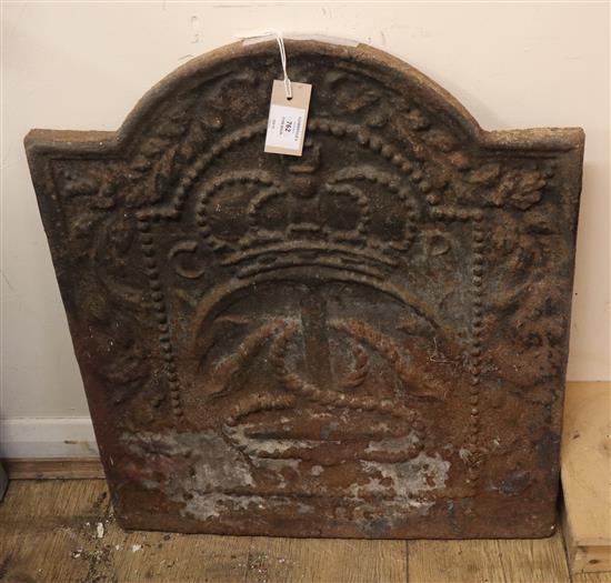 A Charles II cast iron fire back W.54cm